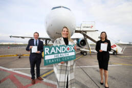 John McConnell, H&J Martin, Judith Davis, Airport Operations Manager, and Sophie Boyd, Project Manager at Randox celebrate the opening of the covid test centre.